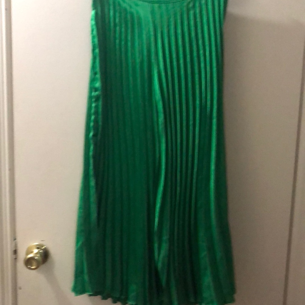 Green pleated skirt